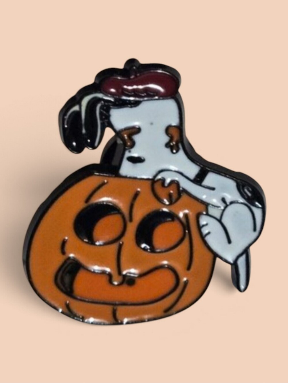 Peanuts: Snoopy on Jack-O'-Lantern Enamel Pin